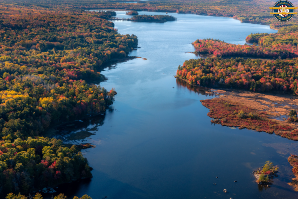 Lake and Autumn Forest from Above – Acadia National Park Aerial view of a lake surrounded by autumn forest in Acadia National Park