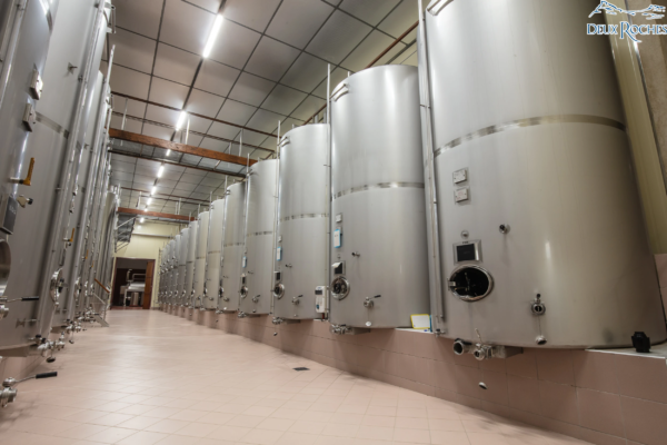 Stainless steel fermentation tanks at Deux Roches winery Large stainless steel wine tanks inside the Deux Roches winery.