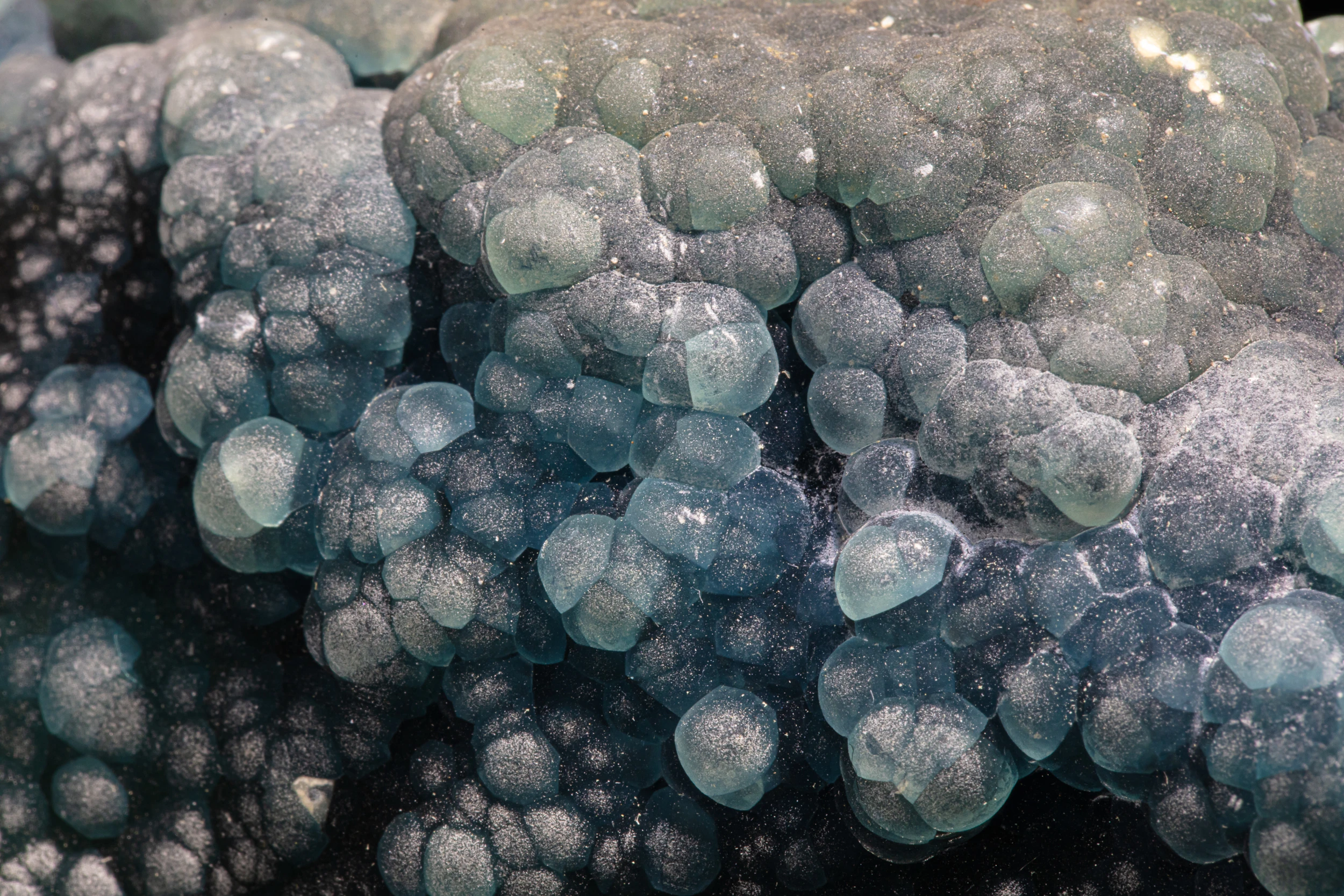 Close-up of blue botryoidal plumbogummite crystals from Yangshuo Mine, Guangxi, China.