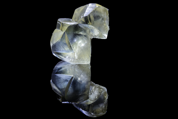 Twinned Calcite – Kazakhstan – Mineral Specimen Photography Twinned calcite crystal from Kazakhstan, photographed on black reflective vinyl