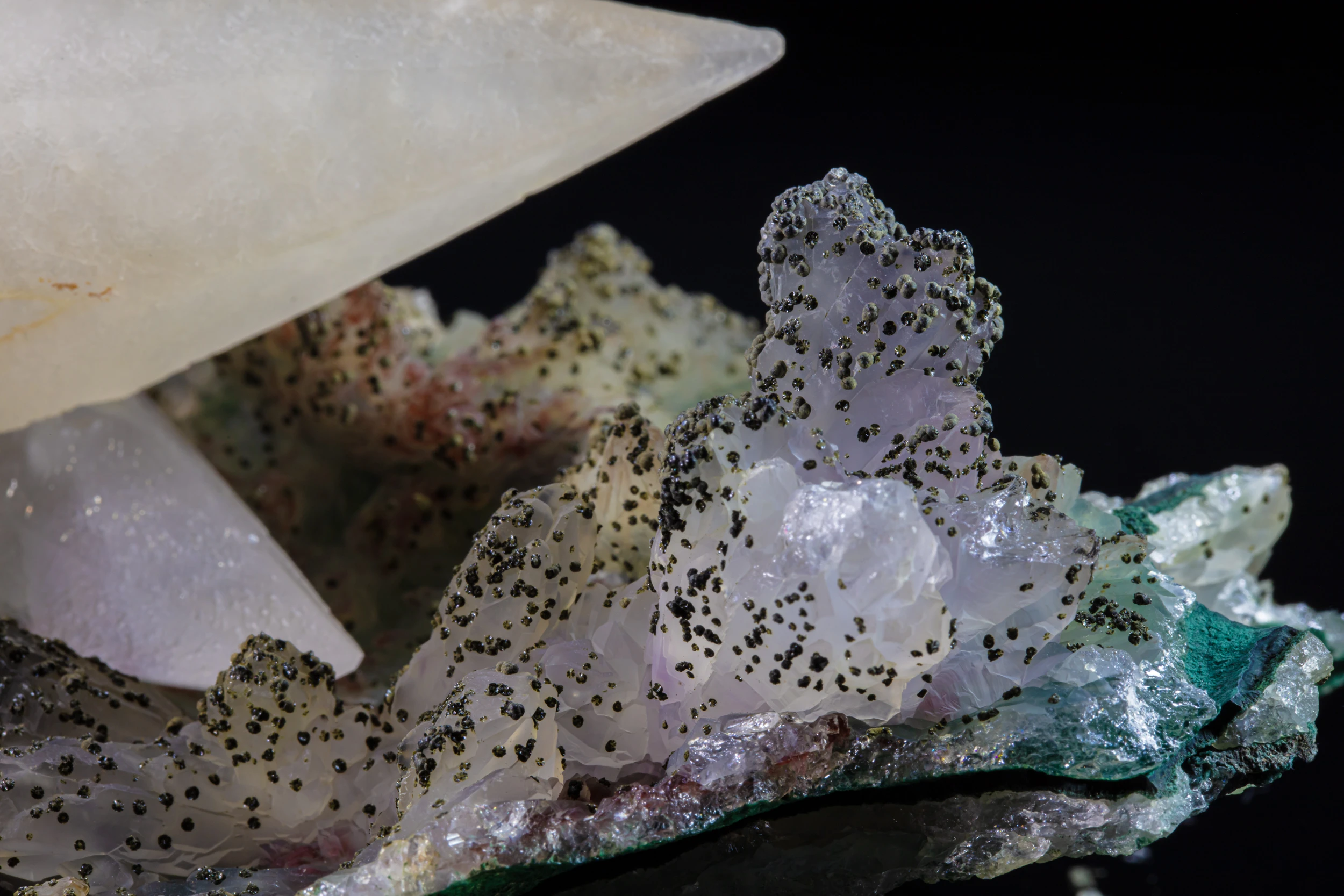 Close-up of a calcite mineral specimen with unidentified inclusions – Rock of Science project 2021