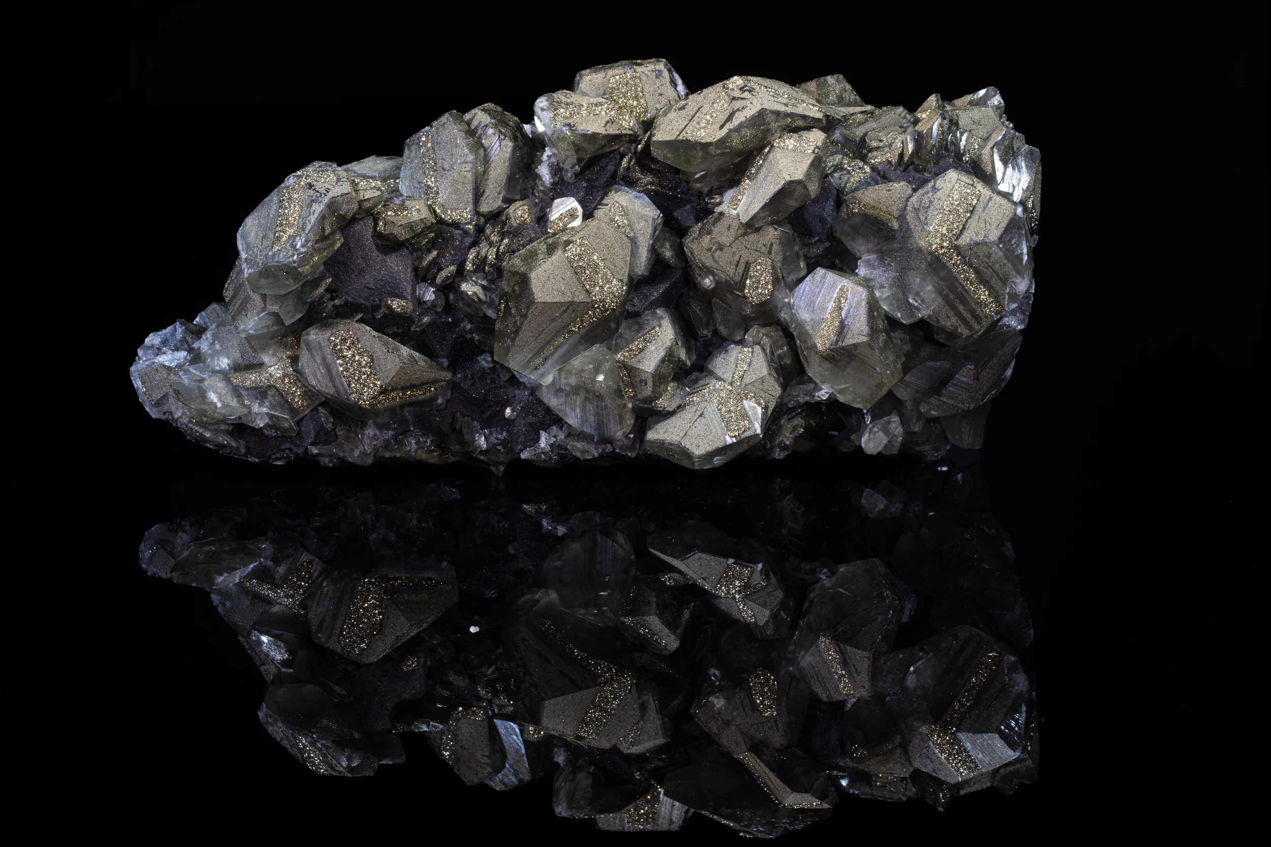 Reflective studio photo of Pyrite and Calcite crystal cluster from China