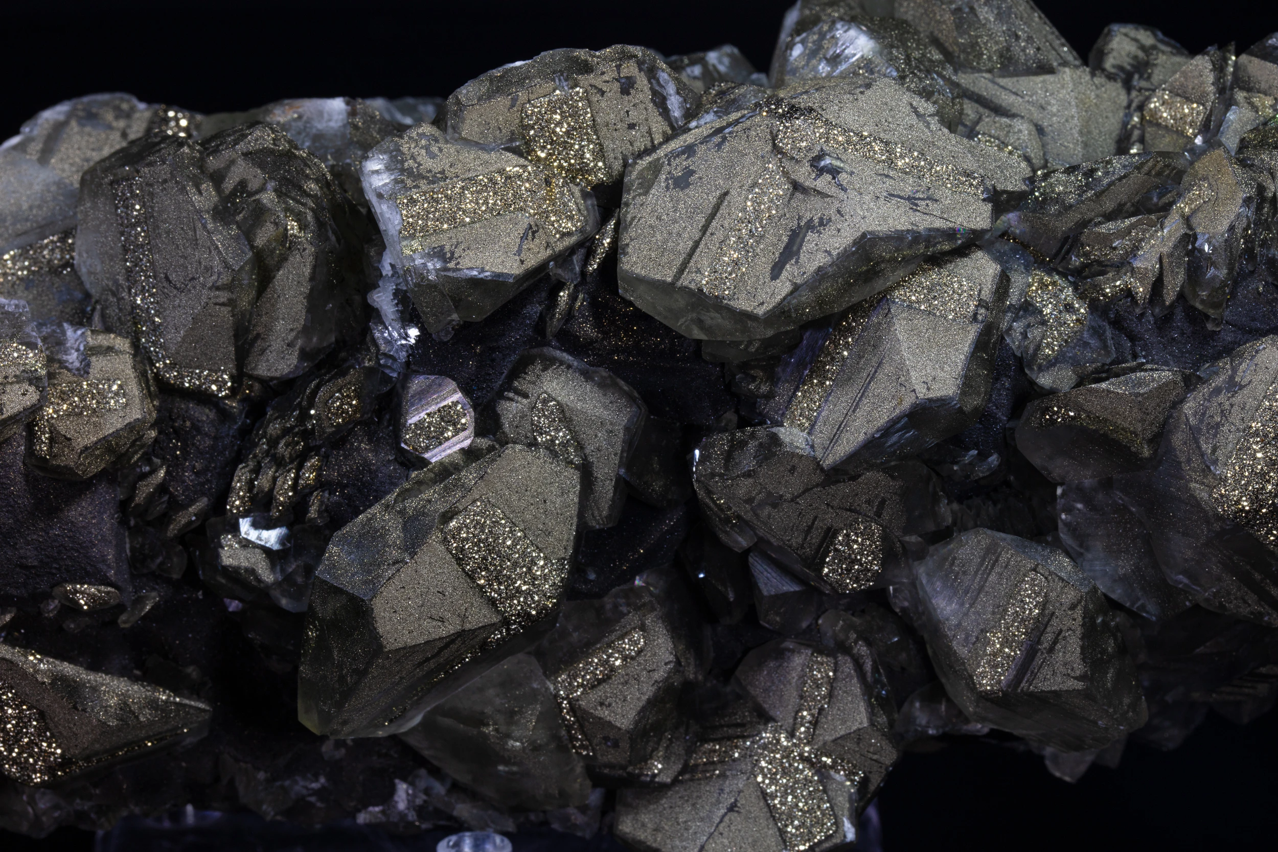 Extreme close-up of Pyrite and Calcite crystals – detailed texture and metallic sheen